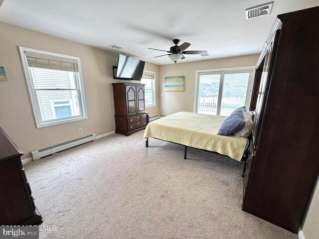 953 Capstan Dr, Forked River, NJ 08731 - bedroom featuring a baseboard radiator, baseboard heating, light colored carpet, access to outside, and a ceiling fan