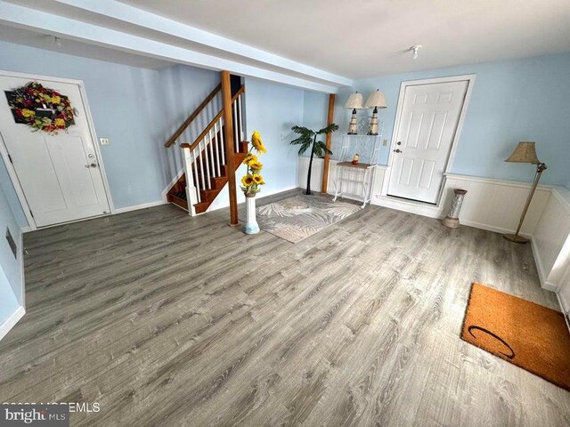 953 Capstan Dr, Forked River, NJ 08731 - foyer with stairs, wood finished floors, and wainscoting