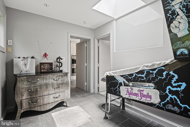 1 Regency Ct Unit 1, Baltimore, MD 21208 - bedroom with a skylight