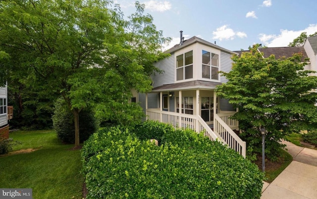 3430 Littleleaf Pl, Laurel, MD 20724 - view of front of house featuring covered porch, stairway, and a front lawn