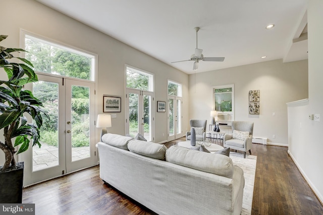 4110 Ingomar St NW, Washington, DC 20015 - living room with a baseboard heating unit, dark wood-style flooring, a ceiling fan, and recessed lighting