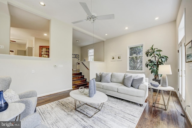 4110 Ingomar St NW, Washington, DC 20015 - living room with wood finished floors, ceiling fan, stairs, and recessed lighting