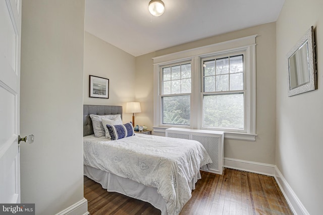 4110 Ingomar St NW, Washington, DC 20015 - bedroom featuring radiator and hardwood / wood-style flooring