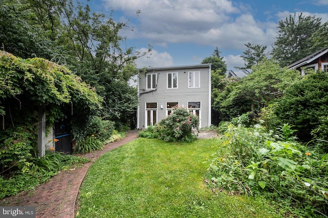 4110 Ingomar St NW, Washington, DC 20015 - rear view of house featuring a lawn
