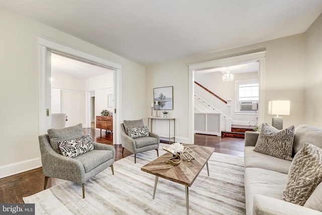 4110 Ingomar St NW, Washington, DC 20015 - living area featuring stairs, a chandelier, wood finished floors, and cooling unit