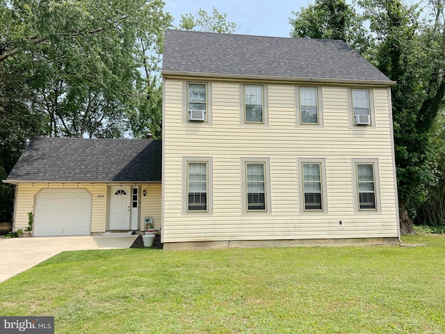 203 Spring Dr, Voorhees, NJ 08043 - colonial house with an attached garage, a front yard, concrete driveway, cooling unit, and a shingled roof