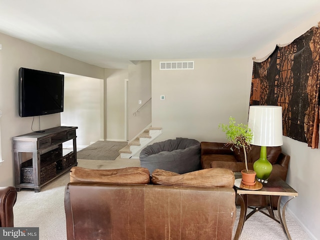 203 Spring Dr, Voorhees, NJ 08043 - carpeted living room featuring stairs and baseboards