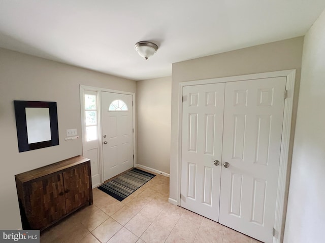 203 Spring Dr, Voorhees, NJ 08043 - foyer entrance featuring light tile patterned floors and baseboards