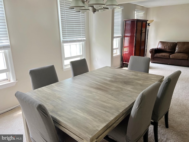 203 Spring Dr, Voorhees, NJ 08043 - carpeted dining space with a chandelier