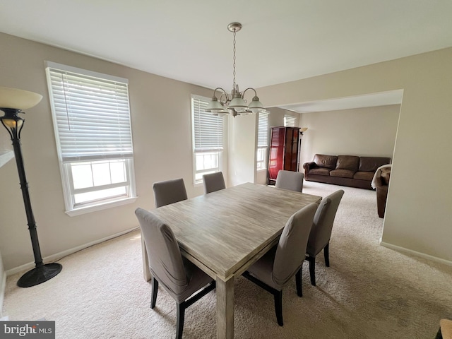 203 Spring Dr, Voorhees, NJ 08043 - dining space with a chandelier and light carpet