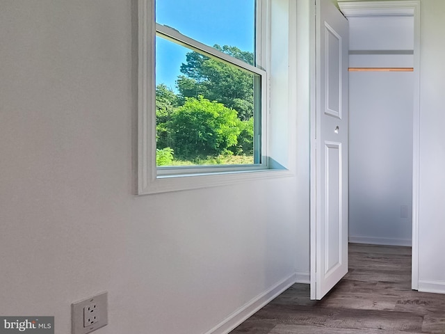 2450 Happy Creek Rd, Front Royal, VA 22630 - unfurnished bedroom featuring multiple windows and wood finished floors