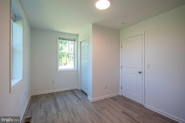2450 Happy Creek Rd, Front Royal, VA 22630 - unfurnished bedroom featuring wood finished floors and a closet