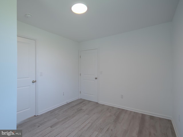 2450 Happy Creek Rd, Front Royal, VA 22630 - spare room featuring light wood-style flooring and baseboards