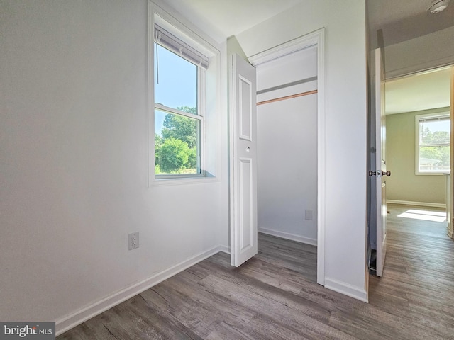 2450 Happy Creek Rd, Front Royal, VA 22630 - unfurnished bedroom featuring wood finished floors and a closet