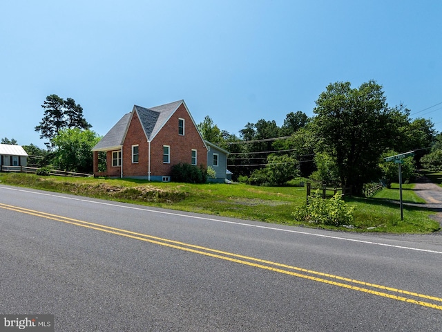 2450 Happy Creek Rd, Front Royal, VA 22630 - view of home's exterior featuring a yard and brick siding