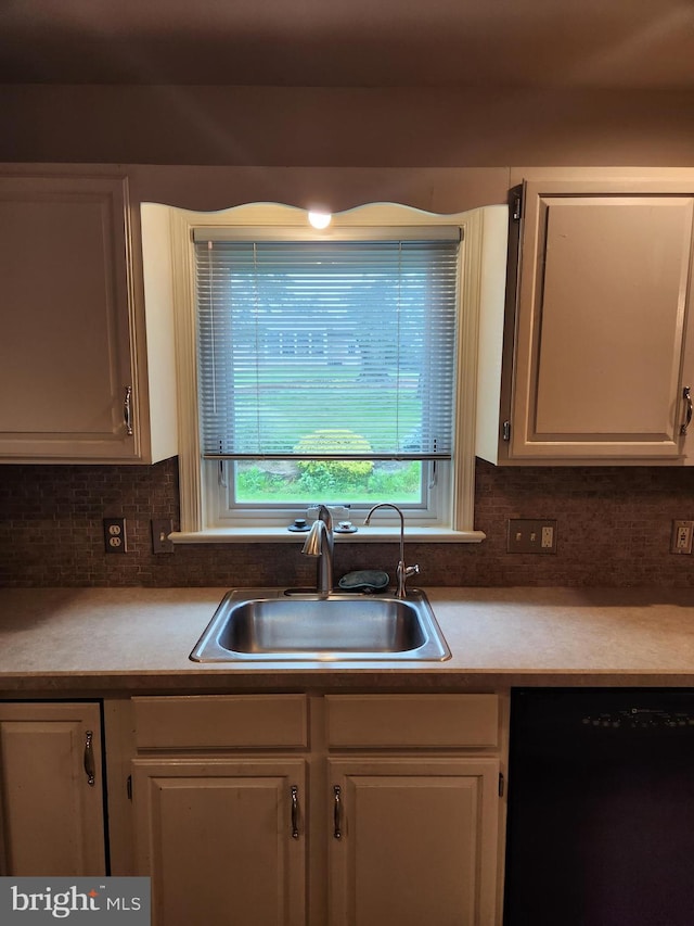 208 E 6th St, Lititz, PA 17543 - kitchen with dishwasher, tasteful backsplash, white cabinets, and light countertops