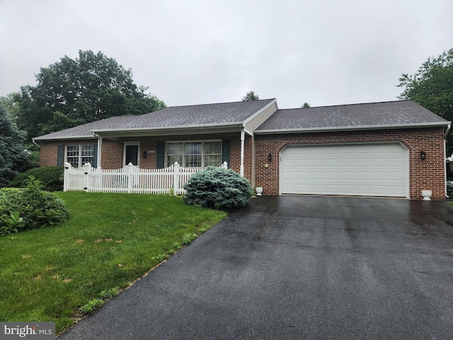 208 E 6th St, Lititz, PA 17543 - single story home featuring brick siding, a garage, driveway, and roof with shingles