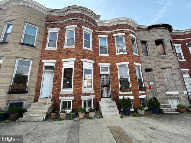2311 Orem Ave, Baltimore, MD 21217 - townhome / multi-family property featuring entry steps and brick siding