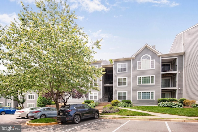20406 Shore Harbour Dr Unit 4-A, Germantown, MD 20874 - view of property with uncovered parking and stairs