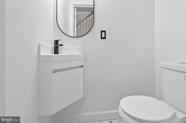 2002 E Lafayette Ave, Baltimore, MD 21213 - bathroom featuring toilet and vanity