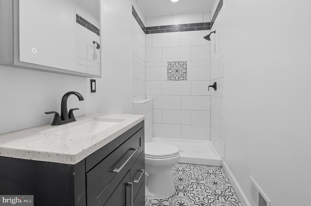 2002 E Lafayette Ave, Baltimore, MD 21213 - bathroom featuring a stall shower, vanity, and tile patterned flooring