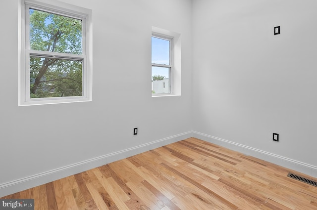 2002 E Lafayette Ave, Baltimore, MD 21213 - unfurnished room featuring baseboards and wood finished floors