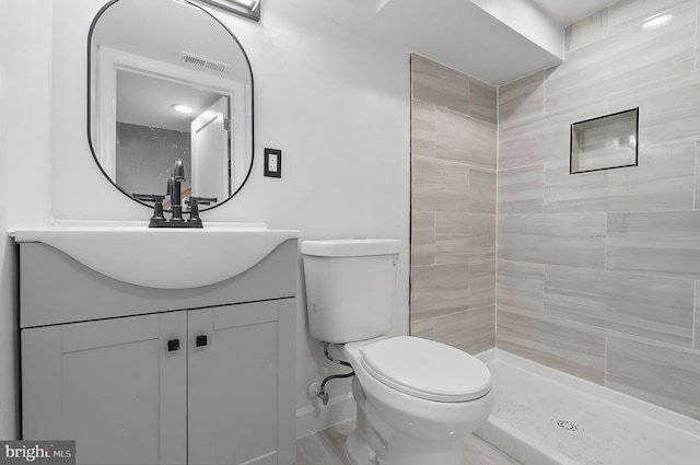2002 E Lafayette Ave, Baltimore, MD 21213 - bathroom featuring vanity and a tile shower