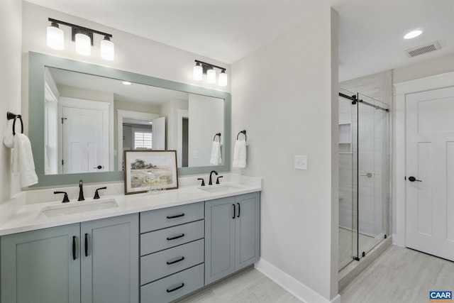 1603 Griffen Grv, Charlottesville, VA 22901 - full bathroom with double vanity, a stall shower, and recessed lighting