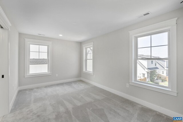 1603 Griffen Grv, Charlottesville, VA 22901 - spare room with healthy amount of natural light and light colored carpet