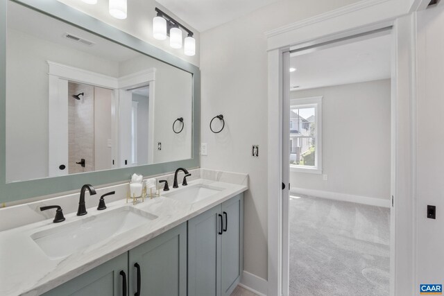 1603 Griffen Grv, Charlottesville, VA 22901 - full bathroom with double vanity and baseboards