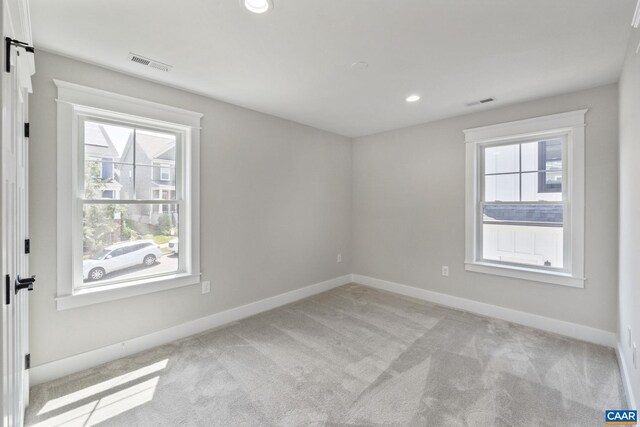 1603 Griffen Grv, Charlottesville, VA 22901 - unfurnished room with light colored carpet and recessed lighting