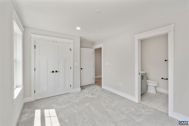 1603 Griffen Grv, Charlottesville, VA 22901 - unfurnished bedroom with carpet floors, a closet, connected bathroom, and recessed lighting