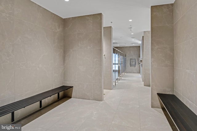 3421 Angelica Way Unit 404, Frederick, MD 21704 - hallway with tile walls, recessed lighting, and tile patterned floors