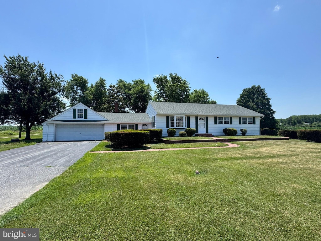 556 Boyds Corner Rd, Middletown, DE 19709 - ranch-style house featuring a front lawn, an attached garage, and driveway