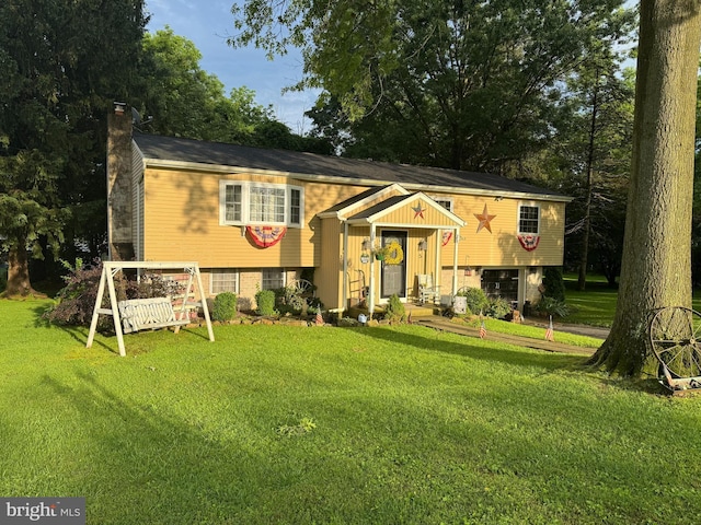 5 Michele Ct, Reading, PA 19606 - split foyer home featuring a chimney and a front lawn