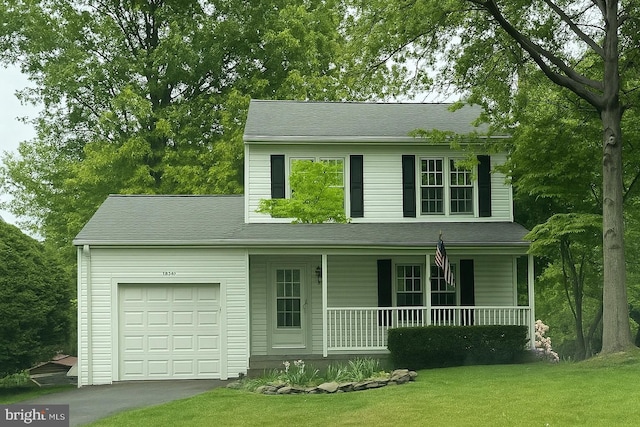13305 Cloverdale Pl, Germantown, MD 20874 - view of front of home with a porch, an attached garage, driveway, and a front yard