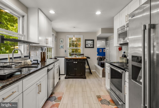 124 Connecticut Ave, Cherry Hill, NJ 08002 - kitchen with appliances with stainless steel finishes, white cabinetry, decorative backsplash, recessed lighting, and dark stone counters