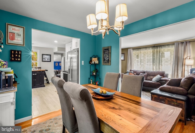 124 Connecticut Ave, Cherry Hill, NJ 08002 - dining space featuring a chandelier and light wood-type flooring