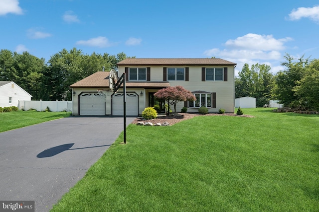 4 Monterey Ln, Manalapan, NJ 07726 - view of front of home featuring driveway and an attached garage