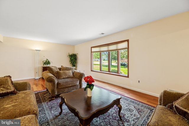 4 Monterey Ln, Manalapan, NJ 07726 - living area featuring wood finished floors and baseboards
