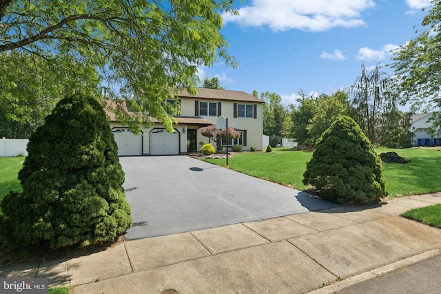 4 Monterey Ln, Manalapan, NJ 07726 - traditional-style home featuring concrete driveway and an attached garage