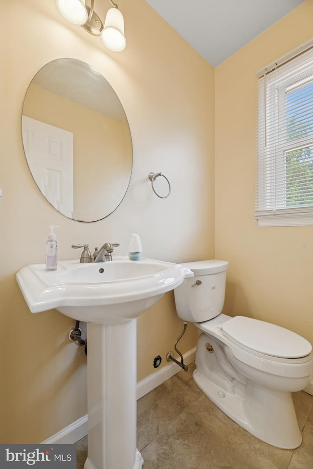 4 Monterey Ln, Manalapan, NJ 07726 - half bath with toilet and tile patterned floors