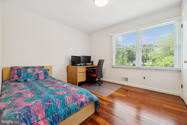 4 Monterey Ln, Manalapan, NJ 07726 - bedroom featuring multiple windows and wood finished floors