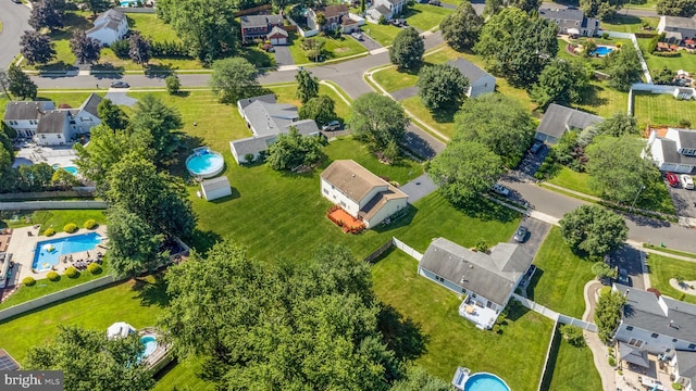 4 Monterey Ln, Manalapan, NJ 07726 - aerial view of residential area featuring a pool