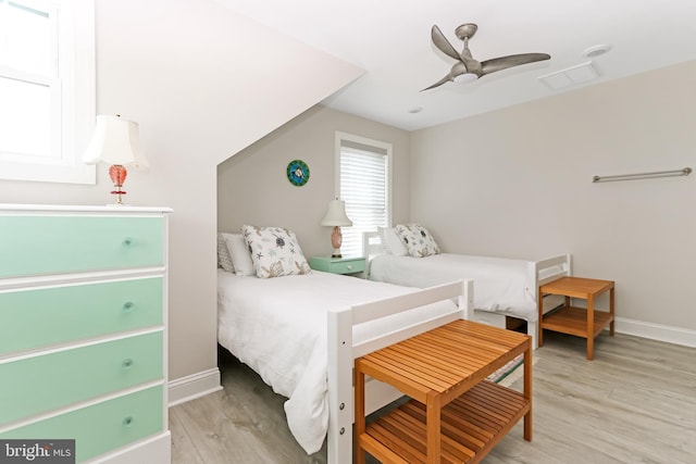 37369 Keel Ct, Greenbackville, VA 23356 - bedroom with light wood-style floors and ceiling fan