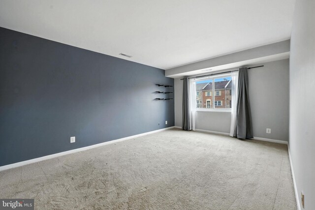 12001 Old Columbia Pike Unit 305, Silver Spring, MD 20904 - carpeted empty room featuring baseboards