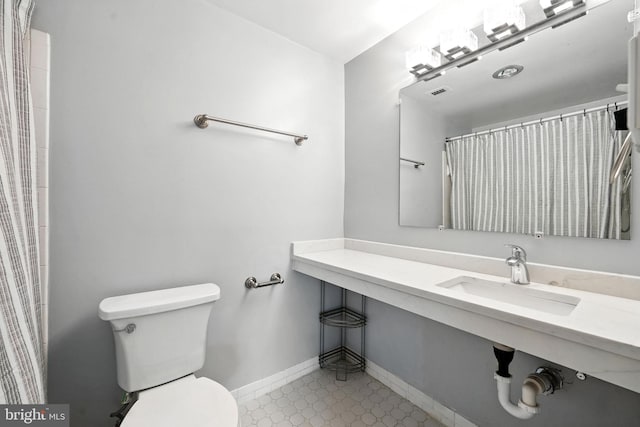 12001 Old Columbia Pike Unit 305, Silver Spring, MD 20904 - full bath featuring toilet and vanity