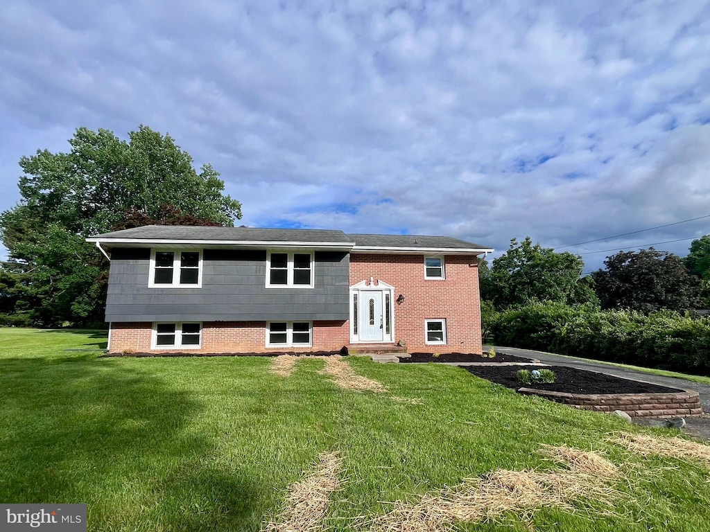 1509 Seminole Ln, Finksburg, MD 21048 - rear view of property with a lawn, brick siding, and entry steps