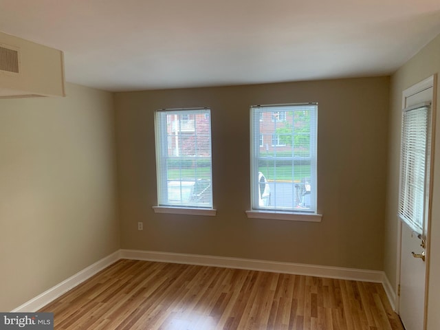 1601 Belle View Blvd Unit A1, Alexandria, VA 22307 - spare room featuring healthy amount of natural light and light wood-style flooring