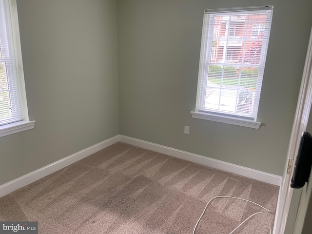 1601 Belle View Blvd Unit A1, Alexandria, VA 22307 - spare room featuring light carpet and baseboards